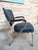 A stunning 1960s retro barber armchair, defined by its sleek chrome frame and classic mid-century styling. The chair...