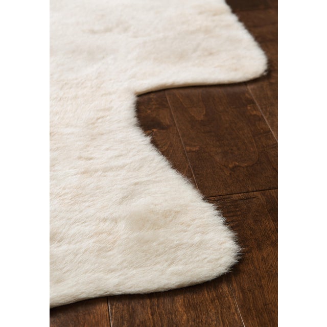 The Grand Canyon is a contemporary rug made in China from woven synthetics. The captivating look and colors are sure to...