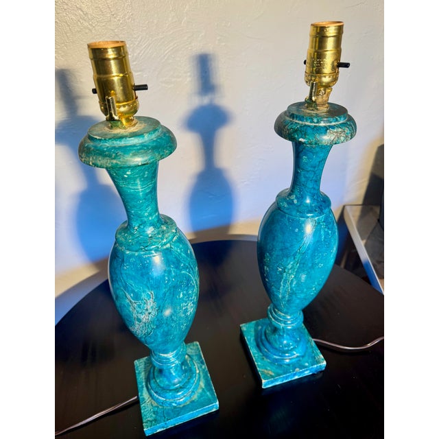 Striking pair of vintage Italian table lamps crafted from solid carved stone, likely alabaster, in a vibrant turquoise...