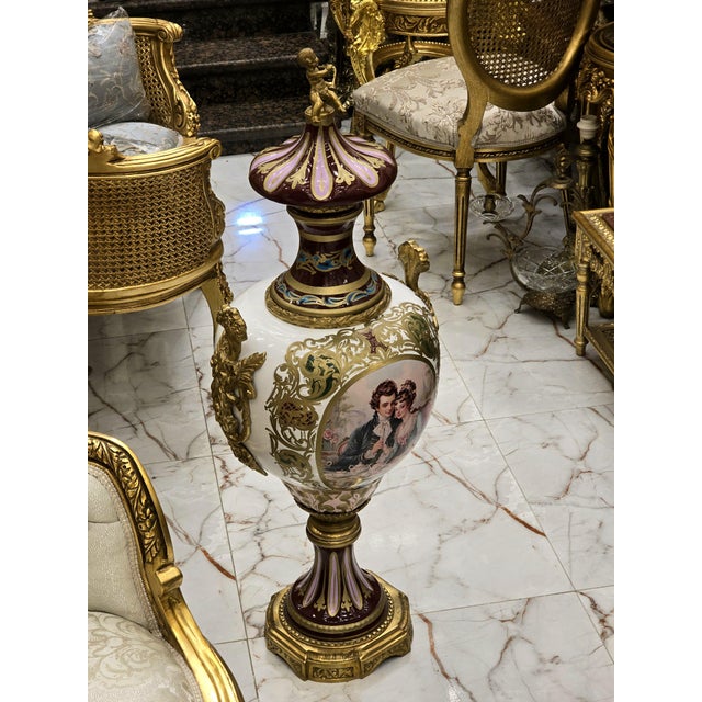 Elevate your space with this exquisite French-style porcelain vase, showcasing timeless elegance and master craftsmanship....