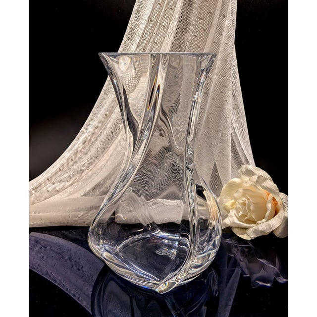 Elegant crystal vase by French luxury maker, Baccarat, in the Serpentin pattern - a fine accent for your home or office....