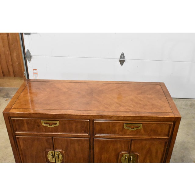 Gorgeous Chinoiserie server or bar cabinet made by Thomasville from their Mystique collection. Made of solid wood with...