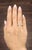This elegant ring is crafted in platinum, showcasing a continuous row of 24 natural radiant-cut white diamonds. Each stone...