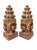 Striking pair of vintage Southeast Asian-inspired four-faced temple sculptures crafted of substantial, heavyweight resin....