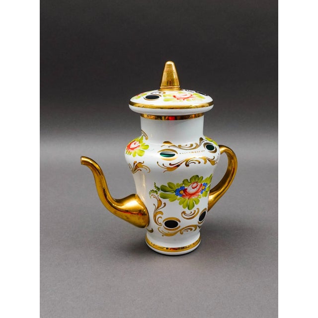 Bohemian Czech White Cut To Green Cased Gold Gilt Hand Painted Floral Tea Pot. Measures approximately 7" long, 4" wide, 8...