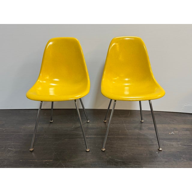 Design Plus Gallery presents a pair of the Case Study Fiberglass H Base Side Chairs from Modernica. Molded yellow...