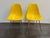 Design Plus Gallery presents a pair of the Case Study Fiberglass H Base Side Chairs from Modernica. Molded yellow...