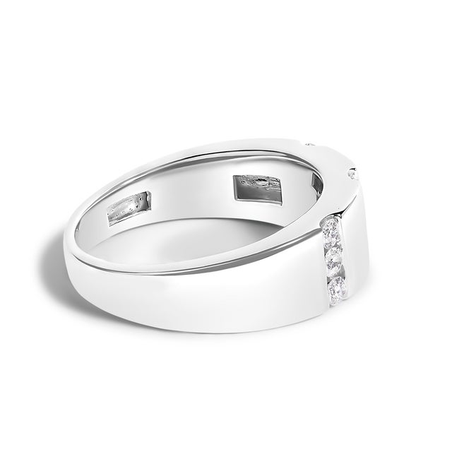 Immerse yourself in the understated elegance of this exquisite men's band, meticulously crafted from .925 sterling silver...