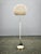 Original Mid-Century Modern floor lamp produced in Germany during the 1960s. Featuring a refined combination of lacquered...