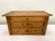 Fantastic old small pine chest, shaped like a mini-commode. It has 3 drawers, two of which are compartmentalised. The...