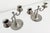 A substantial pair of pewter dual-arm candle holders by Svenskt Tenn, an iconic Swedish design house, still in operation...