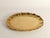 Masterfully crafted brass tray featuring an oval shape with a gracefully contoured, hand-hammered edge. Manual operation...