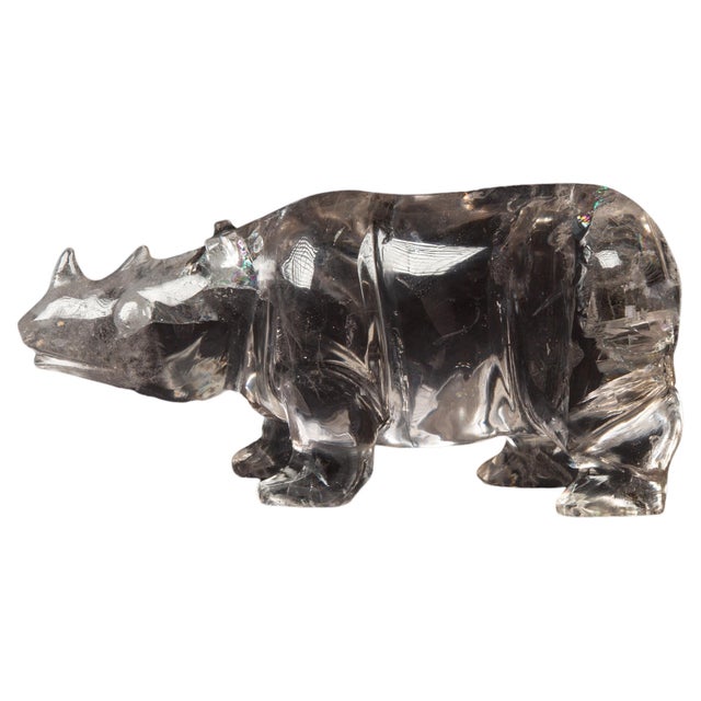 This exceptional large hand-carved rock crystal (quartz) rhino is a magnificent work of art that showcases the skill and...