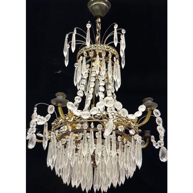 Chandelier in Brass and Crystal, 1900, in Good conditions. Designed 1890 to 1919 European Plug (up to 250V).The wiring of...