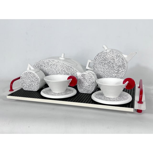 Very good Vintage condition with normal trace of age and use for this white, red and black ceramic tea set with the...
