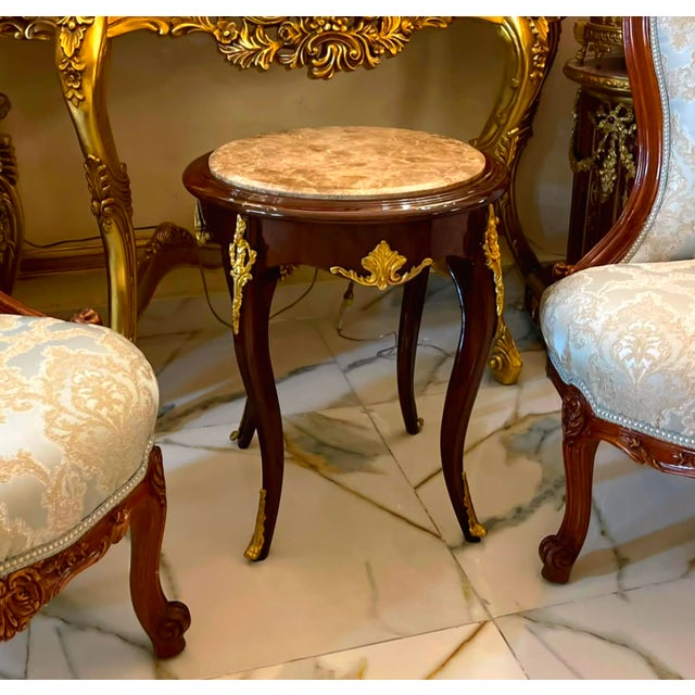 This Baroque style side table is a luxurious statement piece that brings classical French elegance to any interior....
