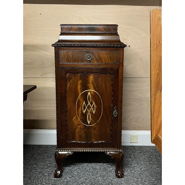 Edwardian Mahogany Wine Cellarette Cabinet with Scottish Crest painted on front in gold leaf. Made of mahogany, standing...