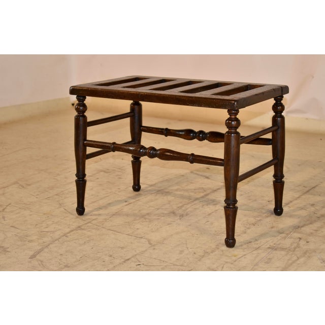 19th century mahogany luggage stand from England. The top is made from thick slats for excellent support of any suitcase,...