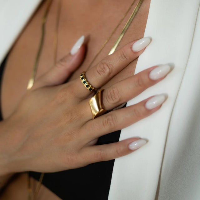 Channel grounding energy with the Majestic Black Onyx Adjustable Gold Statement Ring. The bold black onyx center, framed...