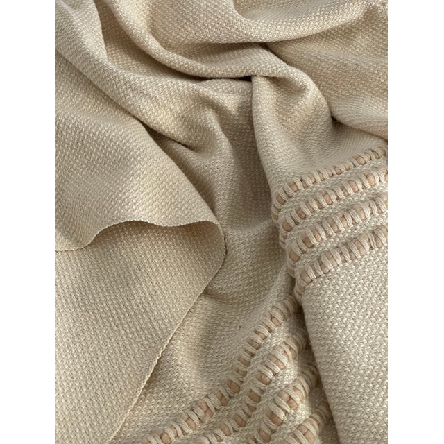 Heavy weight wool blend throw with fringe and detail stitching. At the foot of the bed or on the sofa, this throw has a...