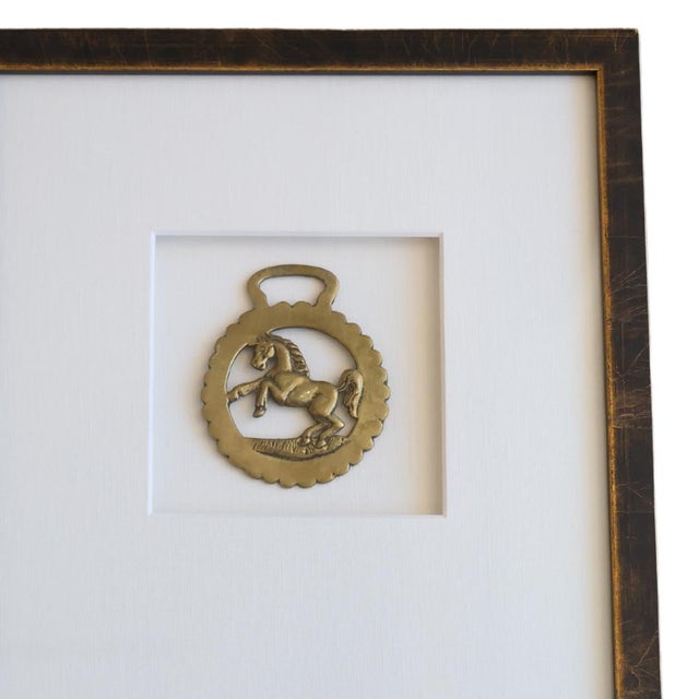 This elegant antique horse bridle medallion, dating back to 19th century France, features a finely crafted horse design,...