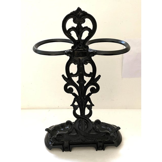 This stylish English Georgian style umbrella holder dates to the late 19th Century. The piece is detailed with two...