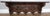 A beautifully crafted Vintage French coat hanger, showcasing rich oak tones and striking hand-carved detailing throughout....