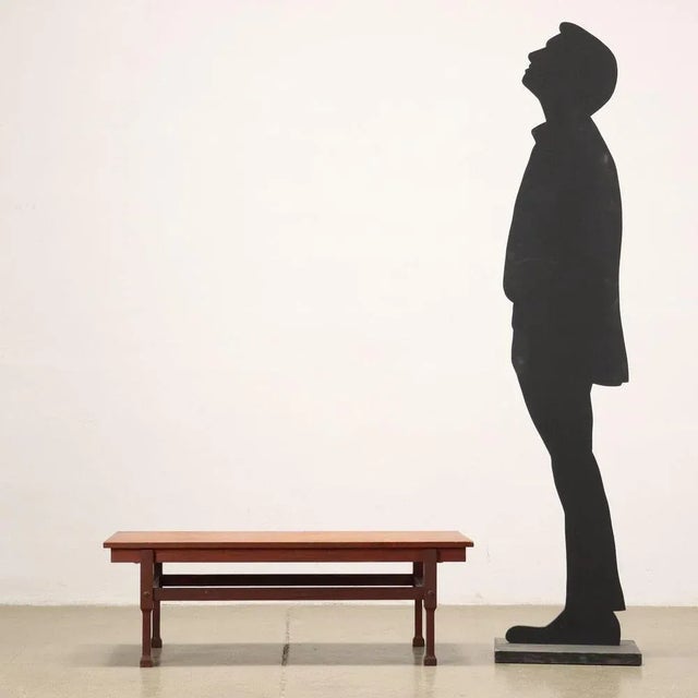 Coffee Table; veneered wood and solid teak. This piece is attributed to the mentioned designer/maker. It has no...