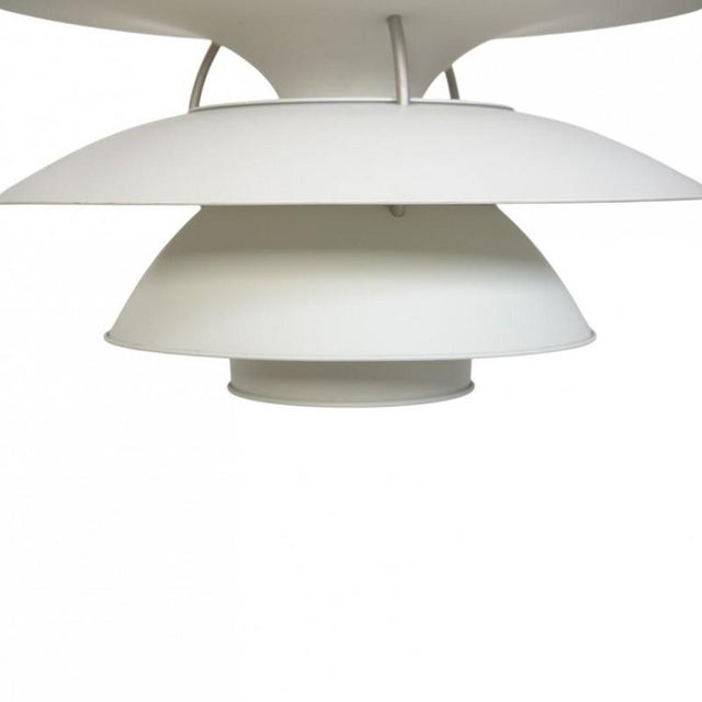Poul henningsen ph6½-6 charlottenborg lamp with white metal shades. The lamp is from the 1990s and appears in good...