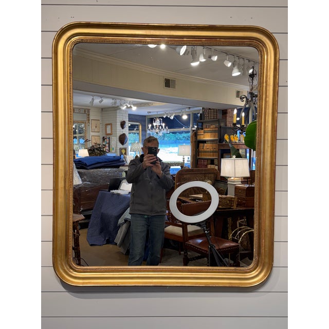 This is an 19th Century Louis Phillipe mirror with all four corners aesthetically rounded! It would incorporate into so...