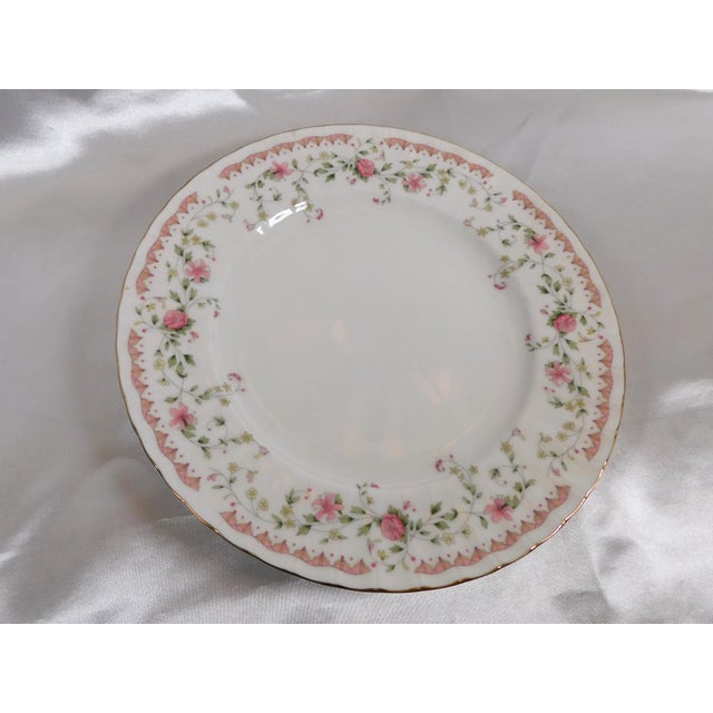 This is a set of five plates by Mikasa in the Radford pattern from 1983. The set includes two dinner plates, a salad...