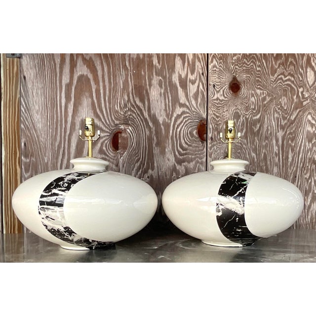 Add a touch of bohemian elegance to your space with this pair of vintage boho glazed ceramic marble slash lamps. These...