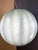 Impressive contemporary Milky-Green Sphere in Murano Glass Swirl. Design in very particular and effective movement. Very...