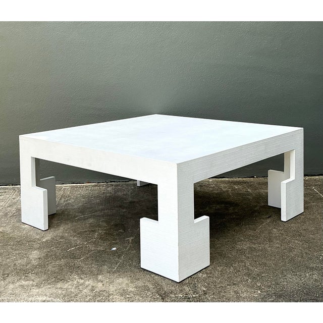 This stunning custom-made coffee table is a brilliant fusion of minimalist form and Chinoiserie flair. Wrapped in...