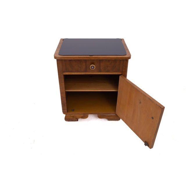 Mid-20th century Art Deco bedside tables, Poland. The furniture is in very good condition, after professional renovation....