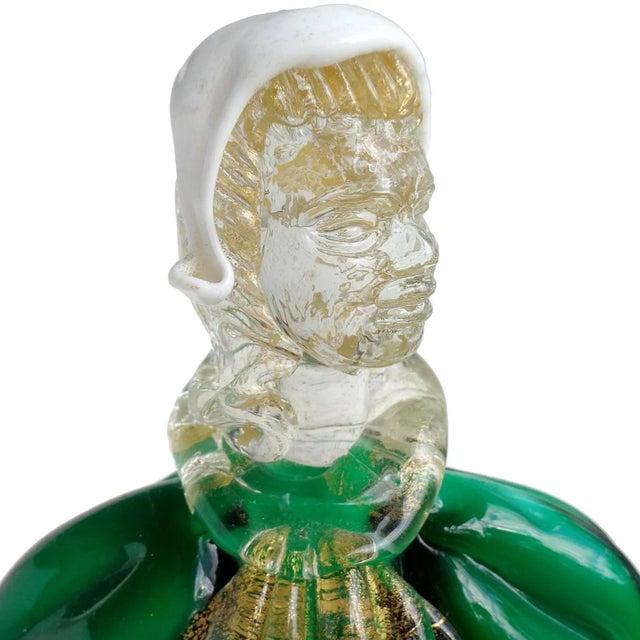 Beautiful vintage Murano hand blown green, red, white and gold flecks Italian art glass woman figure. The piece looks to...