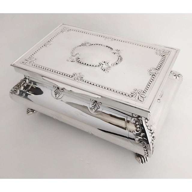 Neoclassical-style 925/1000 sterling silver jewelry box. Illegible silver hallmarks. Spain. 1990s. Lined with blue faux...