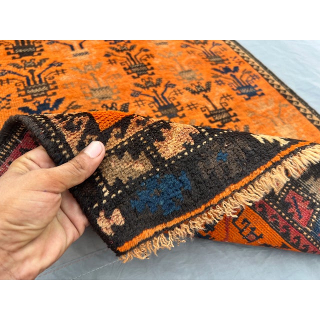 Burnt Orange Vintage Afghan Baluchi Hand-Knotted Wool Rug in Burnt Orange & Navy | 2'1" X 4'11" | Tribal Rug For Sale - Image 8 of 11