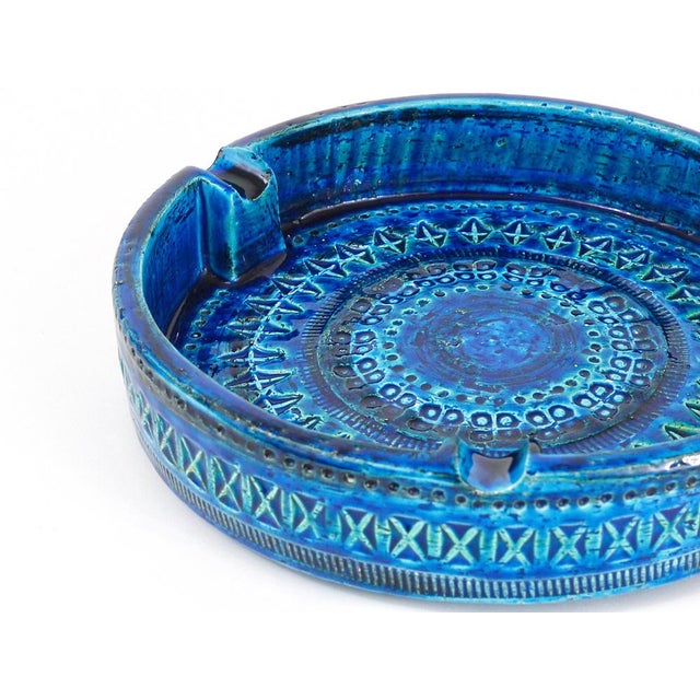 A beautiful, decorative midcentury Rimini blue glazed ashtray. Very large, has a diameter of 9 1/2 inches, Designed by...