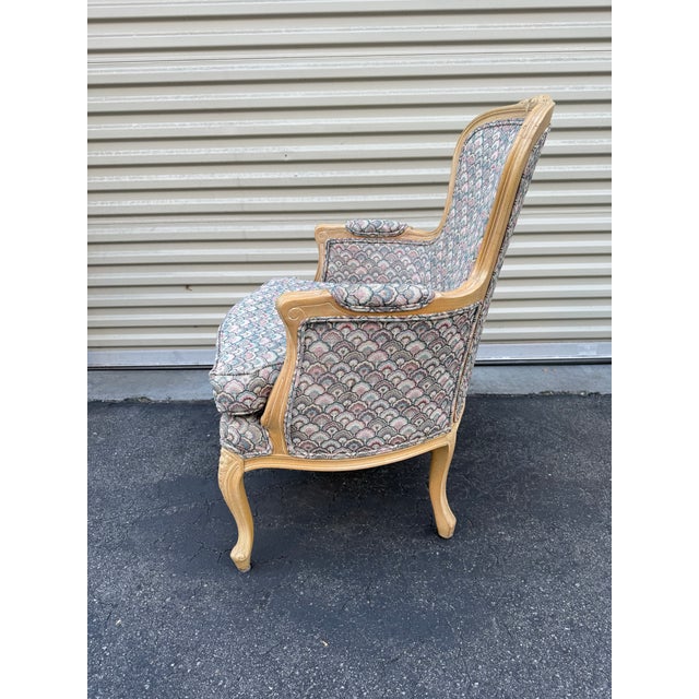 Classic vintage upholstered accent chair by Ethan Allen, showcasing elegant French Provincial–inspired lines and the...
