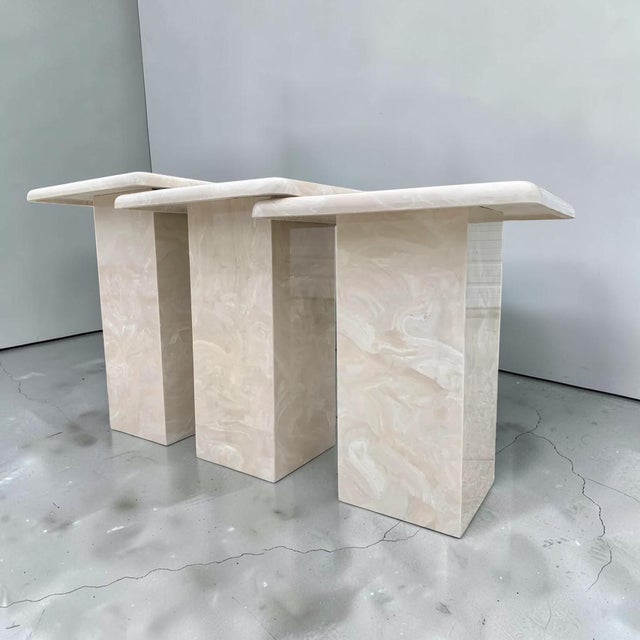 Stunning set of dining height ivory cream colored marble nesting tables. These tables are solid marble tops with thick,...