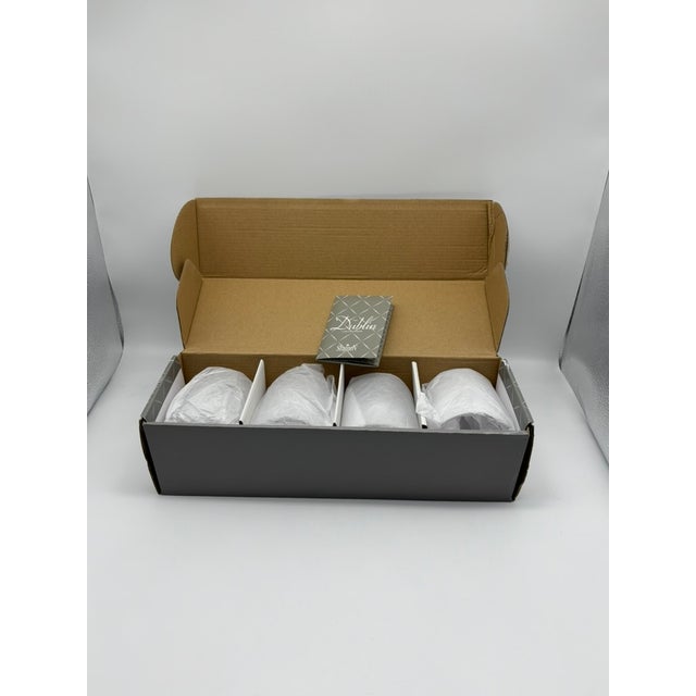 This set of four Shannon Dublin Collection lead crystal double old fashioned glasses combines elegant design with...