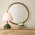 This Sleek Round Mirror Features A Contemporary Design With A Softly Rounded Stainless-steel Frame, All Finished In A...