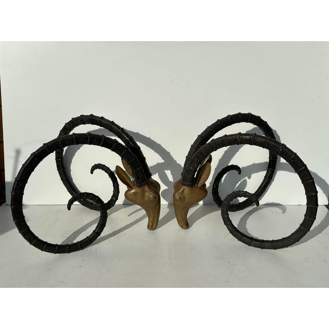 Two tone brass ibex heads dining table or desk. Glass top is not available. This table is made in the style of Alain...