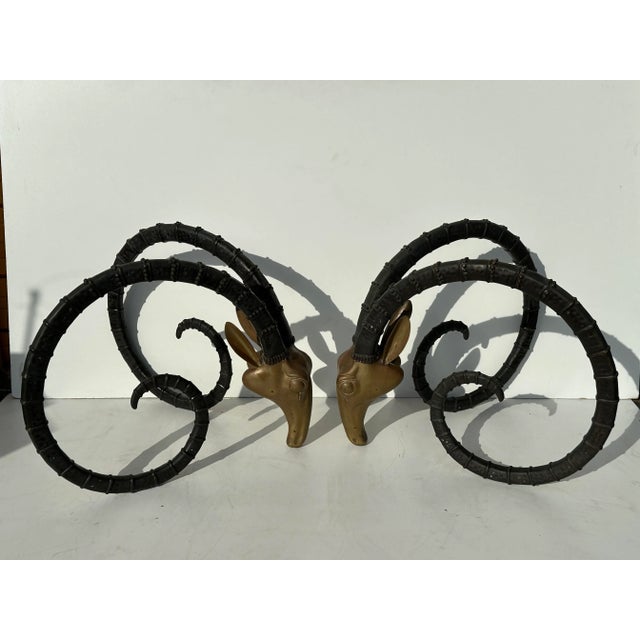 Two tone brass ibex heads dining table or desk. Glass top is not available. This table is made in the style of Alain...