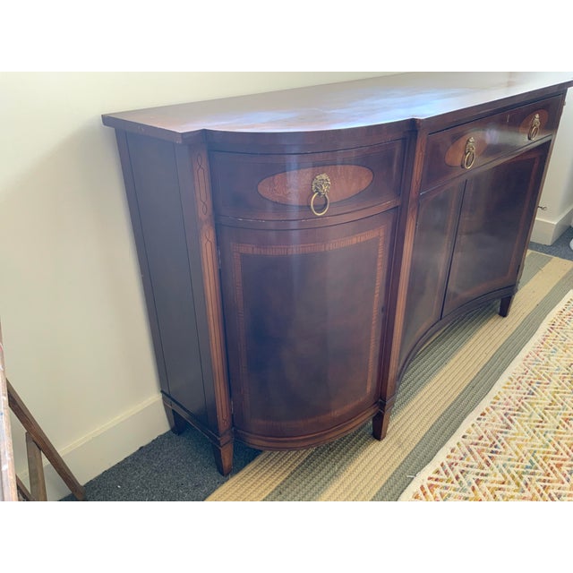 20th Century EJ Victor Federal style console. Wood veneer over wood base. Inlay details, two tone wood veneer pattern....