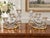A wonderfully decorative matched pair of 1930s three-light crystal candlesticks by the Cambridge Glass Company of Ohio....