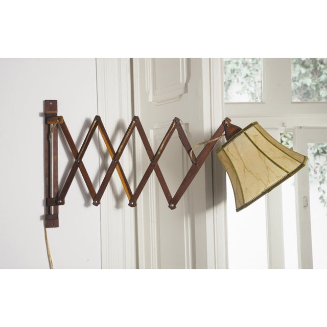 Vintage mid-century scissor wall lamp sconce with an adjustable wooden accordion arm and faceted bell lampshade with green...