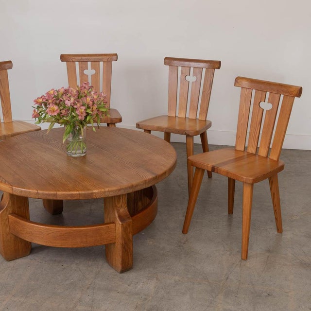Stunning set of 4 pine dining chairs by Goran Malmvall from Sweden, 1970s. Scandinavian Modern style with carved wood back...