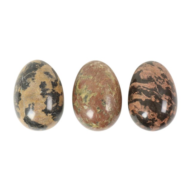 A lovely set of three large eggs made of solid marble or natural stone, dating from around the second half of the 20th...